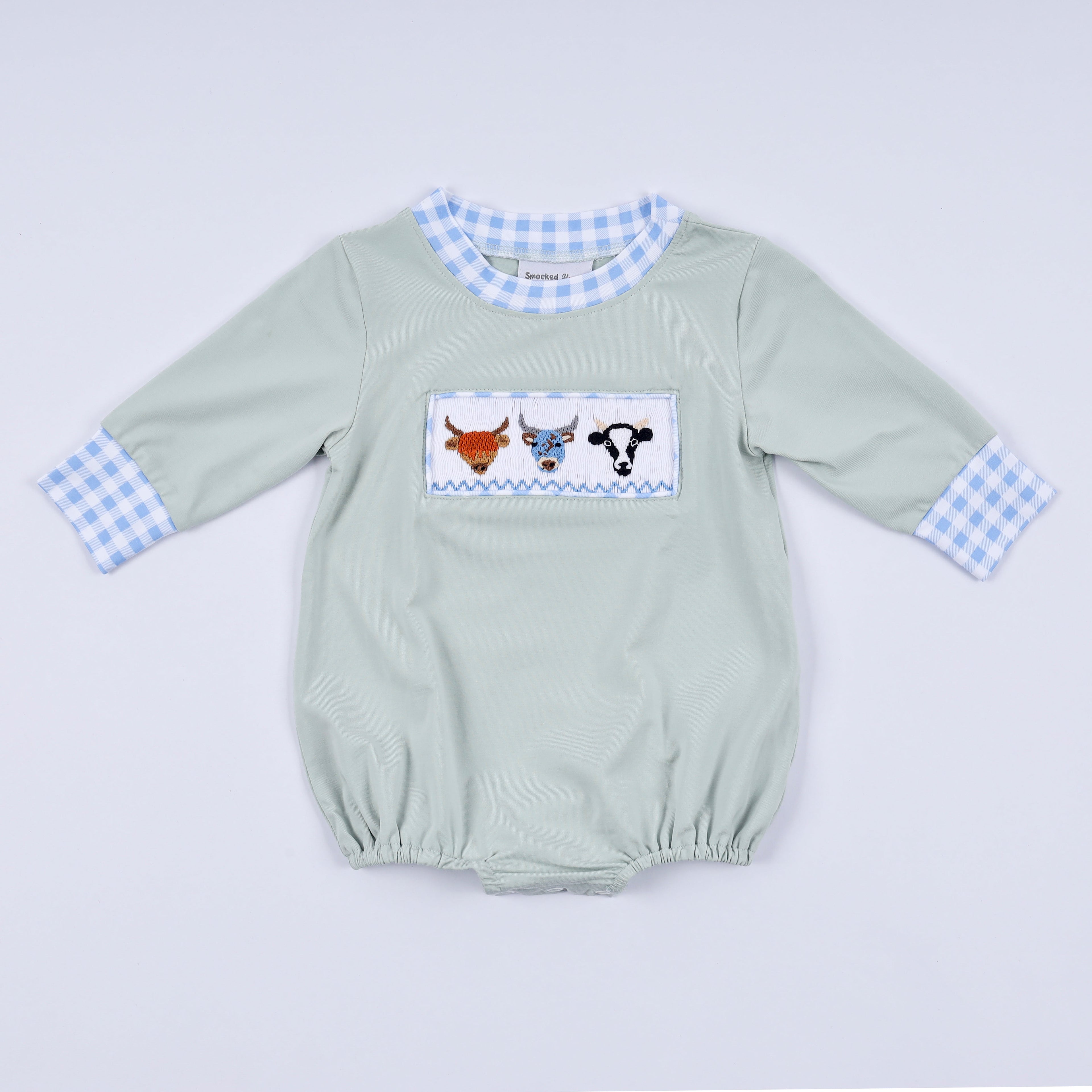 Sage cow hand smocked bubble